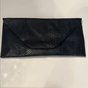 Black Snake-skin Textured Woman’s Clutch Bag
